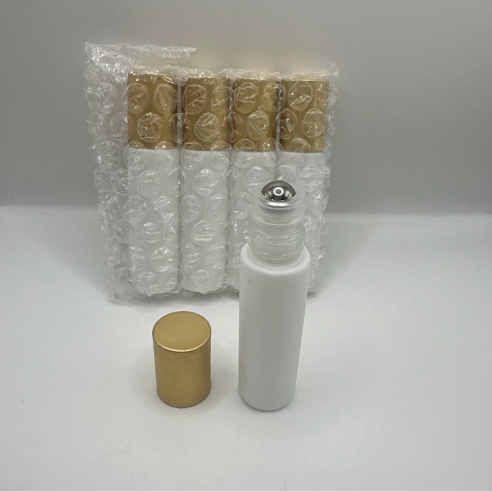 White and Gold Roller Bottles